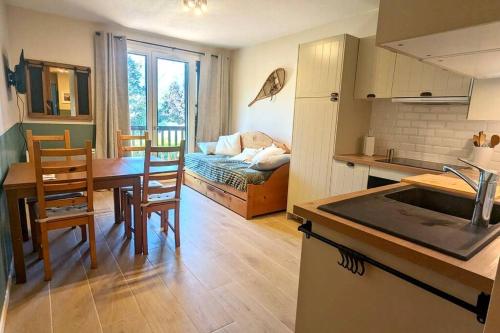 Kuchyň nebo kuchyňský kout v ubytování Cozy Appartement avec vue sur montagne