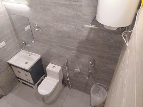 Koupelna v ubytování Pinnacle Vesta Botique Stay