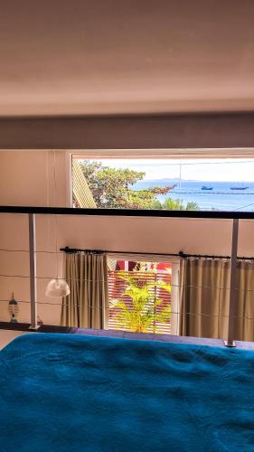 Katil atau katil-katil dalam bilik di Mata Hari Apartamentos