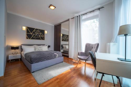 Posteľ alebo postele v izbe v ubytovaní Apartments of Pawia
