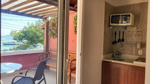 Dapur atau dapur kecil di Mata Hari Apartamentos