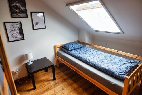 Letto o letti in una camera di Hotel NOCLEGI WRZOSOWA Siedlce