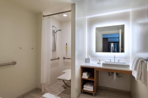 a bathroom with a sink and a shower at Element Austin Downtown in Austin
