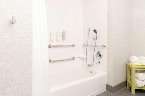 a bathroom with a tub and a shower stall at Hampton Inn & Suites Santa Rosa Sonoma Wine Country in Santa Rosa