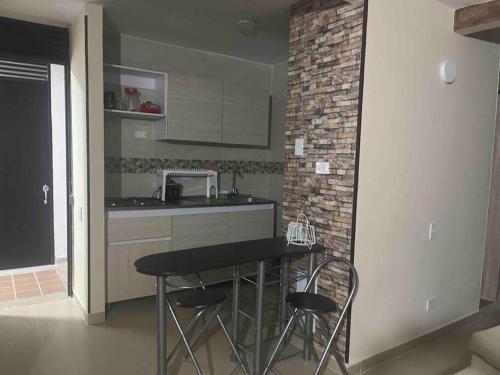 Majoituspaikan Girardot Apartamento lujo keittiö tai keittotila