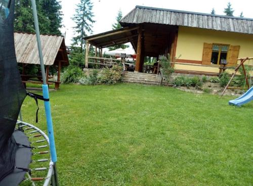 En have udenfor Noclegi NADZAMCZE