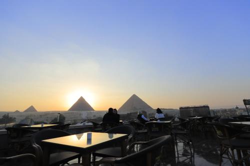 Pyramids and sphinx view hotel