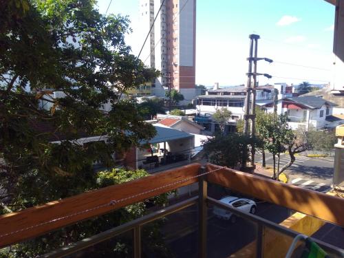 a balcony with a view of a city at Monoambiente céntrico con balcón - Posadas, Misiones in Posadas