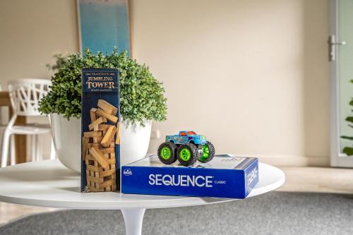 a toy truck sitting on a box on a table at Stylish and Spacious Launceston Villa + Free Wifi in Launceston