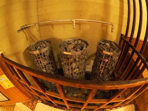 a group of four baskets filled with rocks at Castle Inn Toyokawa in Toyokawa