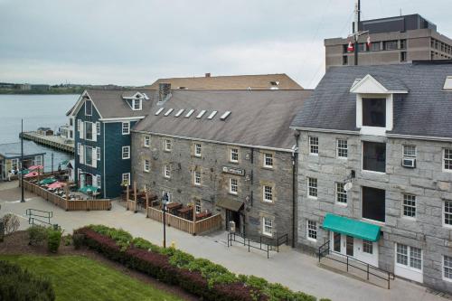 an aerial view of a large building next to the water at Halifax Marriott Harbourfront Hotel in Halifax