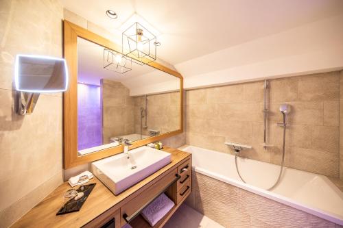 Koupelna v ubytování Hotel Alpina deluxe