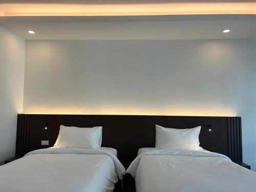 GEEN Hotel Chonburiにあるベッド