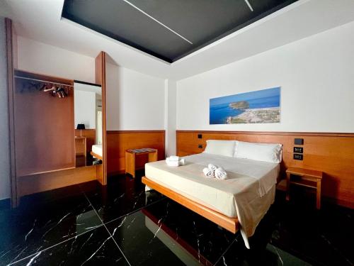 Postel nebo postele na pokoji v ubytování Hotel TEA - Praia a Mare