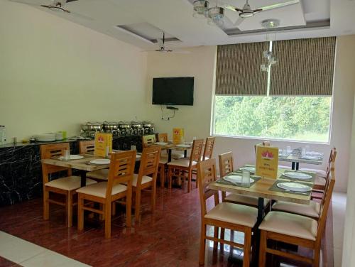Restaurant o un lloc per menjar a Sunny Pines Resort