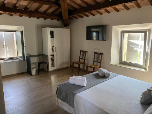 Postel nebo postele na pokoji v ubytování Ca Baruffa B&B