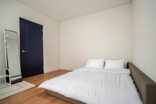 Llit o llits en una habitació de Ililsagye