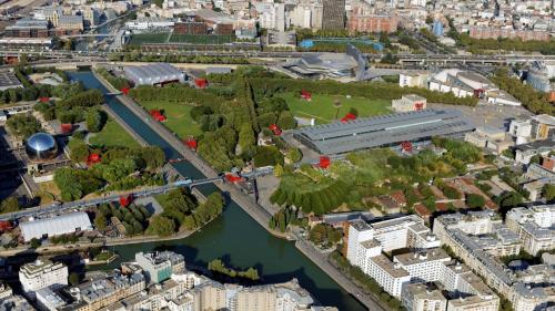 an aerial view of a city with a river and buildings at Studio de charme in Pantin