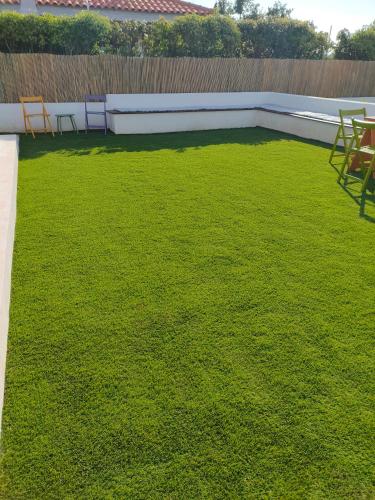 Κήπος έξω από το Feel like Home Pool Villa