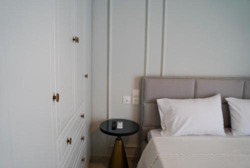 Ένα ή περισσότερα κρεβάτια σε δωμάτιο στο Grand View Suites Meteora