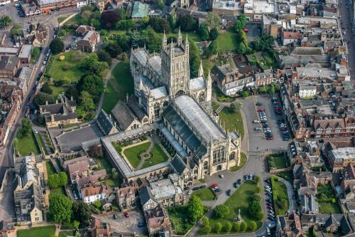 an aerial view of durham cathedral in durham city at Luxe Cosy&Spacious 2 Bed House - Super Fast Wi-Fi & Private Parking Near GLO Airport & Cheltenham Racecourse in Churchdown