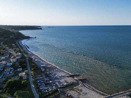 an aerial view of a beach and the ocean at B&B Palazzo Bruni - Dimora di Mare in Marina San Vito
