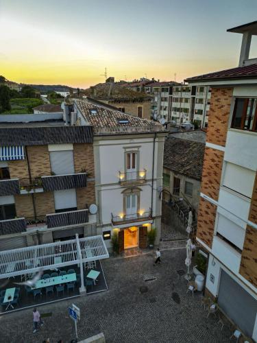 an aerial view of a building in a city at B&B Palazzo Bruni - Dimora di Mare in Marina San Vito