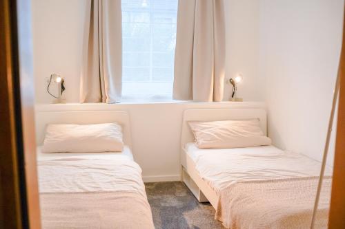 Postel nebo postele na pokoji v ubytování Ferienwohnung Im alten Feld
