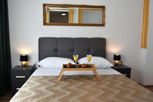 Säng eller sängar i ett rum på Golden Room