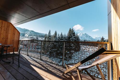 a balcony with a view of the mountains at Hotel Kristall - Adults only in Leutasch