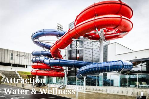 a water slide in front of a building at Casa Jakobsen in Randers