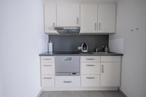 Dapur atau dapur kecil di SEEZEIT Residence