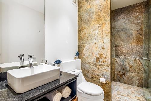 a bathroom with a sink and a toilet at D'Toscana Residencial # 305 in Nuevo Vallarta 