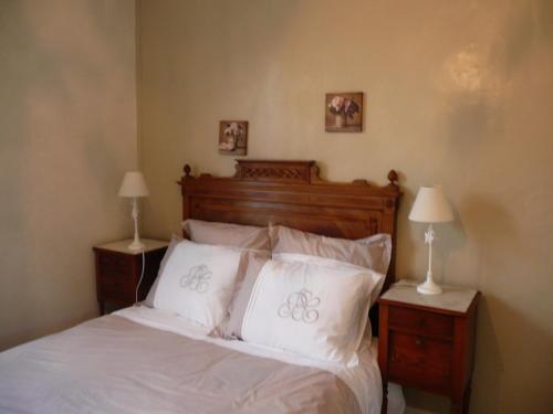 En eller flere senge i et værelse på Les Lilas de Bellefontaine