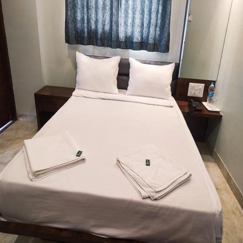 Cama o camas de una habitación en Shankar Residency, Akkalkot