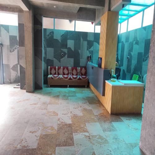 Zona de estar de Shankar Residency, Akkalkot