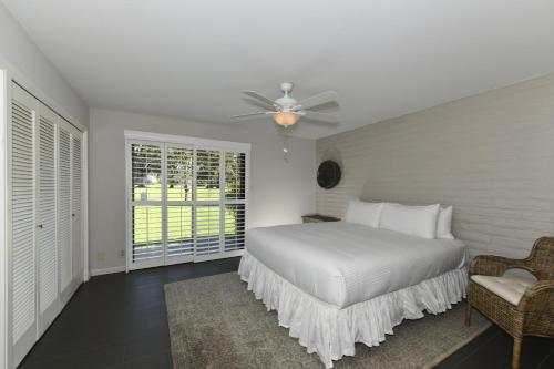 Ένα ή περισσότερα κρεβάτια σε δωμάτιο στο 15 Fairways condo