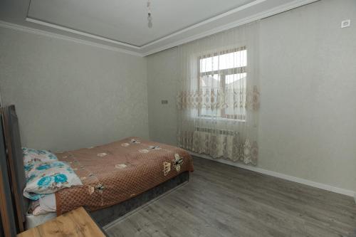 Ένα ή περισσότερα κρεβάτια σε δωμάτιο στο Welcome Inn