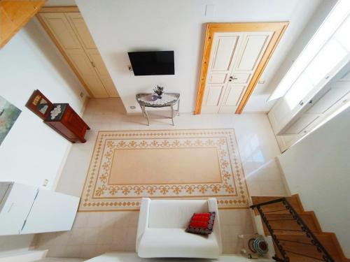 TV a/nebo společenská místnost v ubytování B&B Corte Fiorita