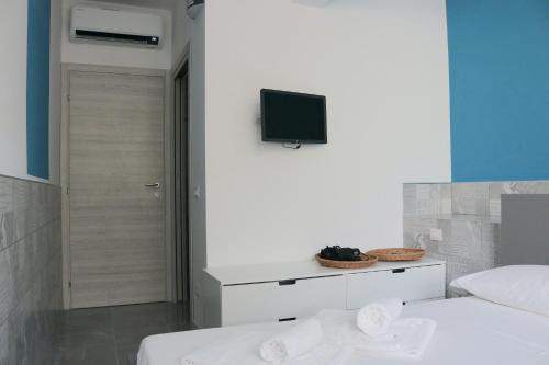 TV a/nebo společenská místnost v ubytování Gambara GuestS House
