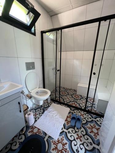 Een badkamer bij Hidden Garden Bungalow