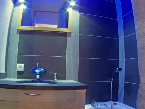 a bathroom with a sink and a mirror at Appartement Valmorel, 3 pièces, 4 personnes - FR-1-291-821 in Valmorel
