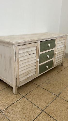 a wooden dresser with drawers on a floor at LUXURY privet room near Tel Aviv in Petaẖ Tiqwa