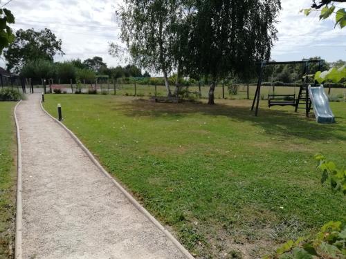 Κήπος έξω από το une Pause à la Campagne