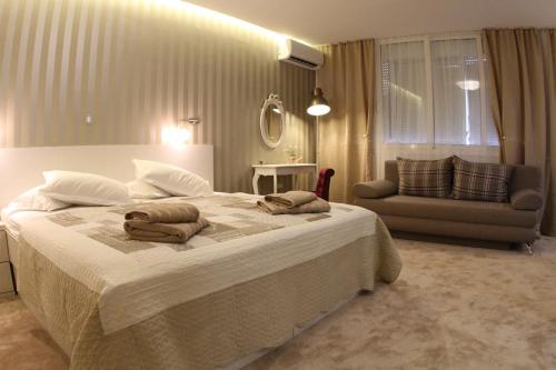 Postel nebo postele na pokoji v ubytování Studio Apartments Mirakul