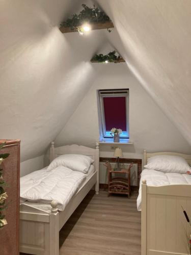 Katil atau katil-katil dalam bilik di Hireu's Hus