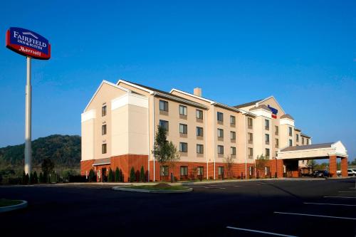 a hotel building with a sign in front of it at Fairfield Inn & Suites Pittsburgh Neville Island in Robinson Township