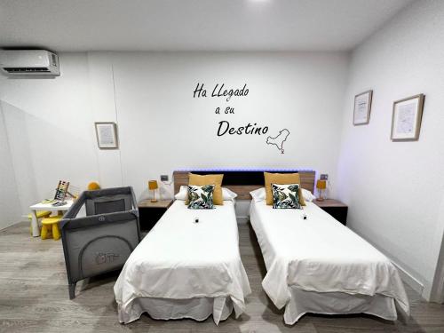 Katil atau katil-katil dalam bilik di Luxury La Restinga