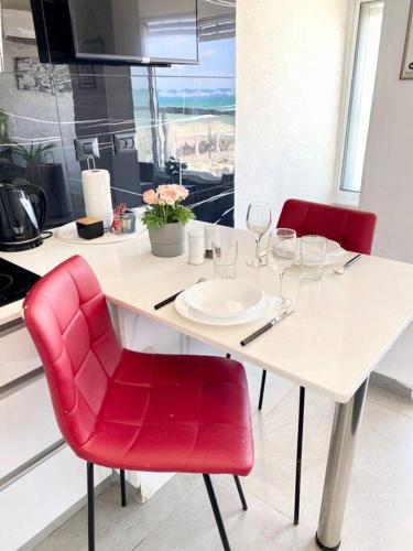 Η κουζίνα ή μικρή κουζίνα στο Seaside cozy apartment