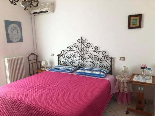 Ένα ή περισσότερα κρεβάτια σε δωμάτιο στο CASA NUCCI